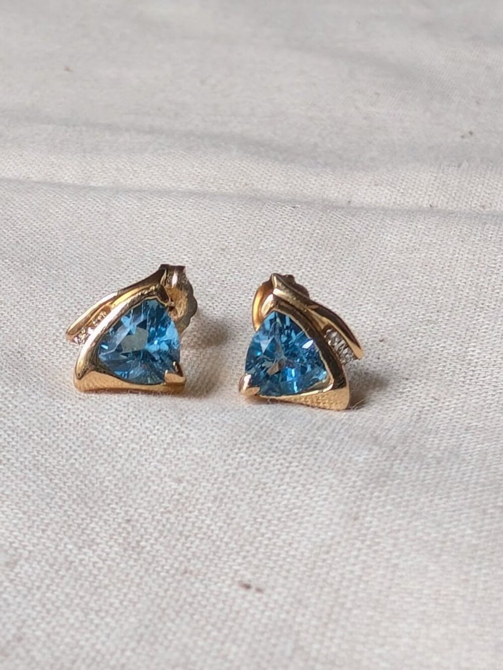Vintage blue topaz earrings with diamond accents
